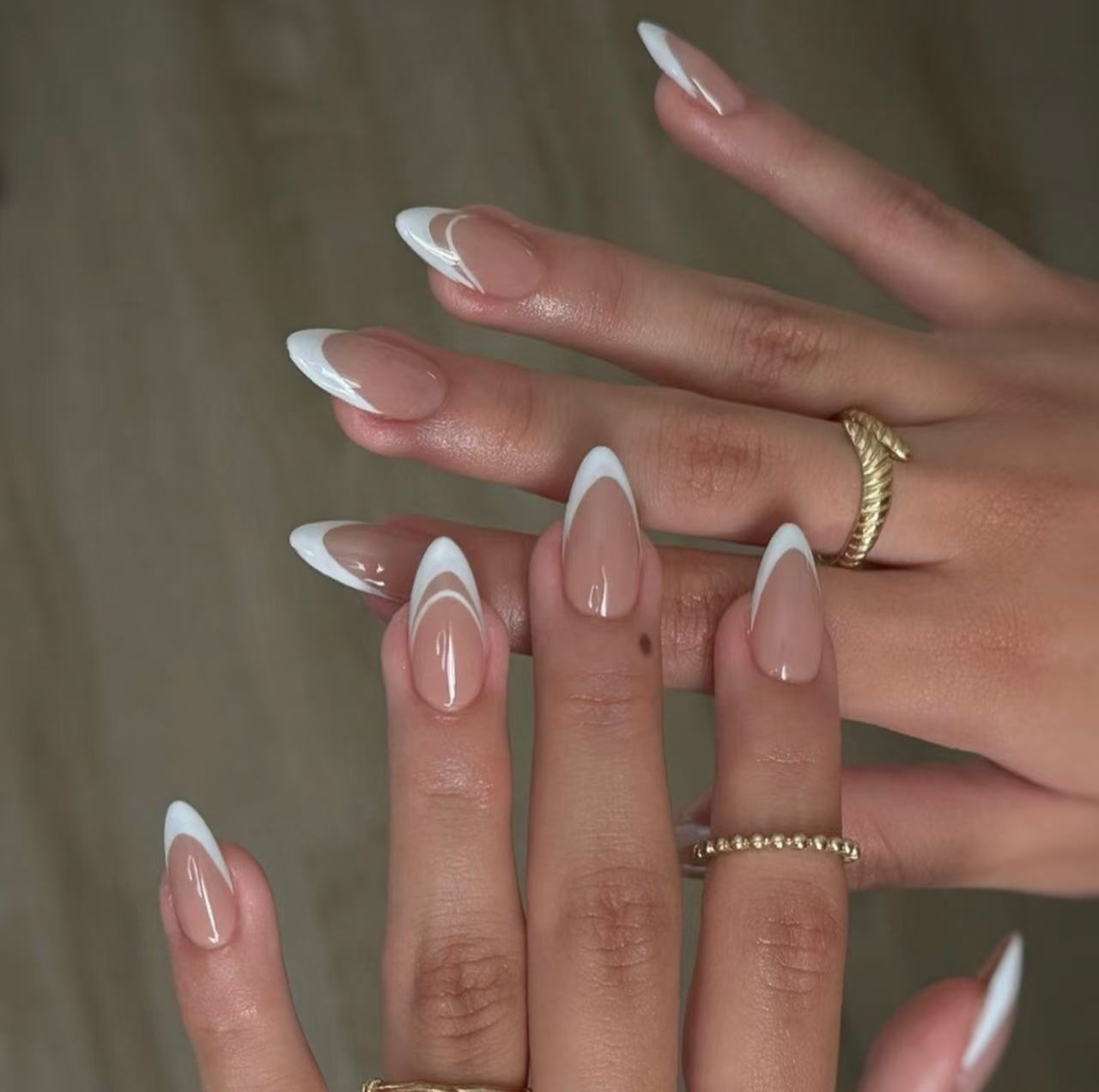 009Modern White Tip French Almond Nails – Chic Nude Base with Trendy Curved Design