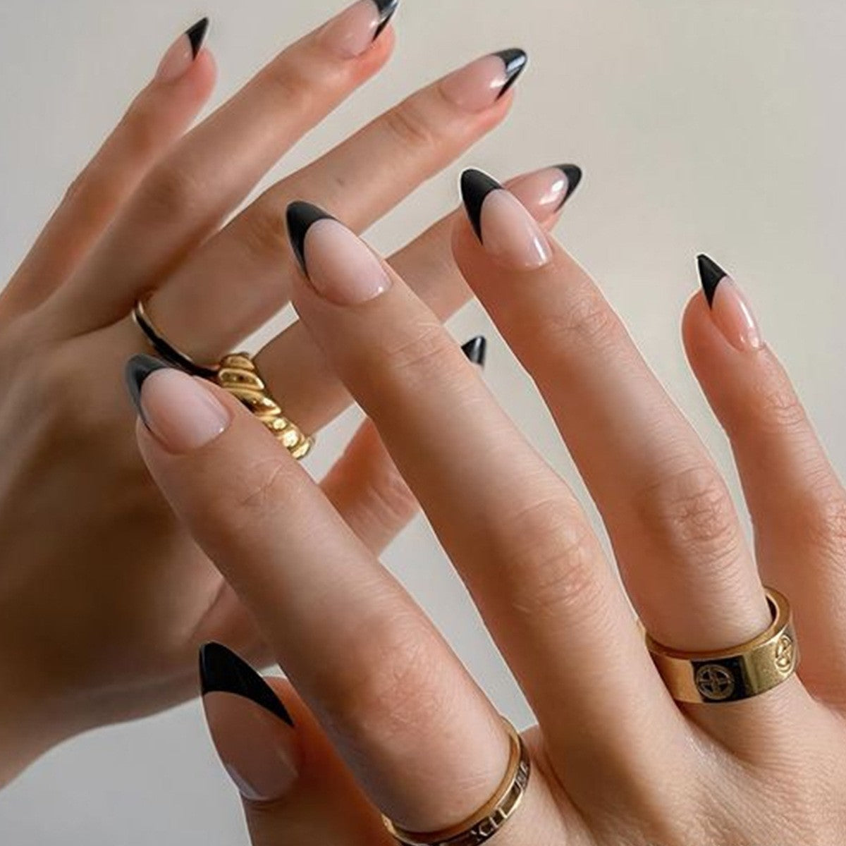 006.Elegant Black Tip French Manicure with Gold Rings – Stylish Nail Art Design for Chic Looks